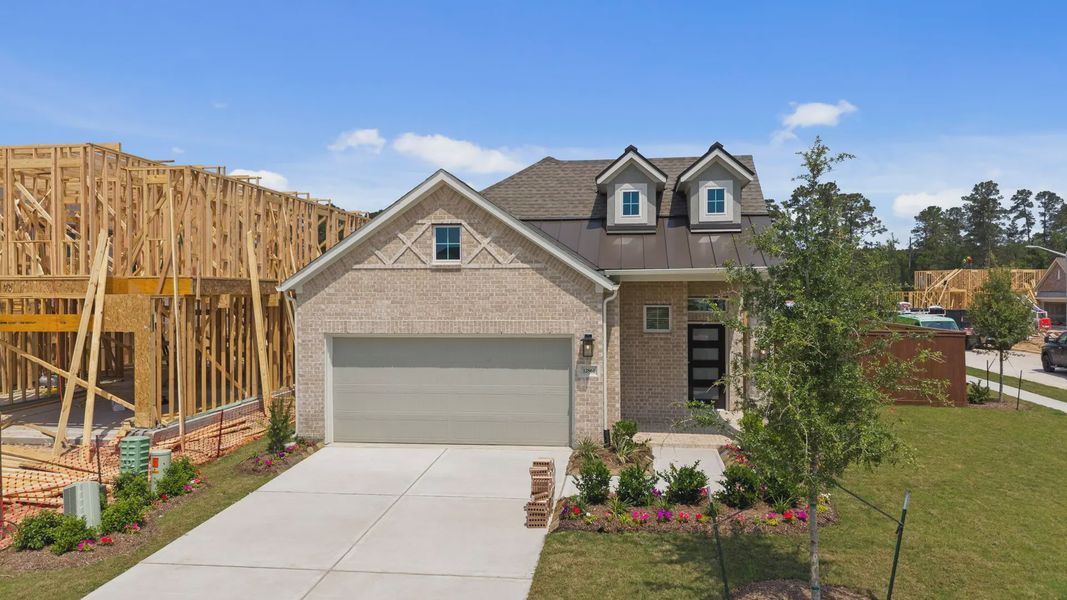 Front exterior of a new home in Evergreen 40s, Conroe, TX, highlighting curb appeal (Image 16). Front exterior of a new home in Evergreen 40s, Conroe, TX, highlighting curb appeal (Image 16).