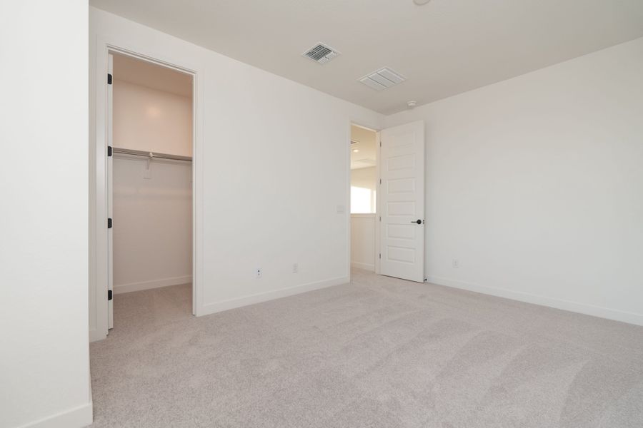 Spacious, unfurnished interior of a new home in Soleo, San Tan Valley (Image 17).