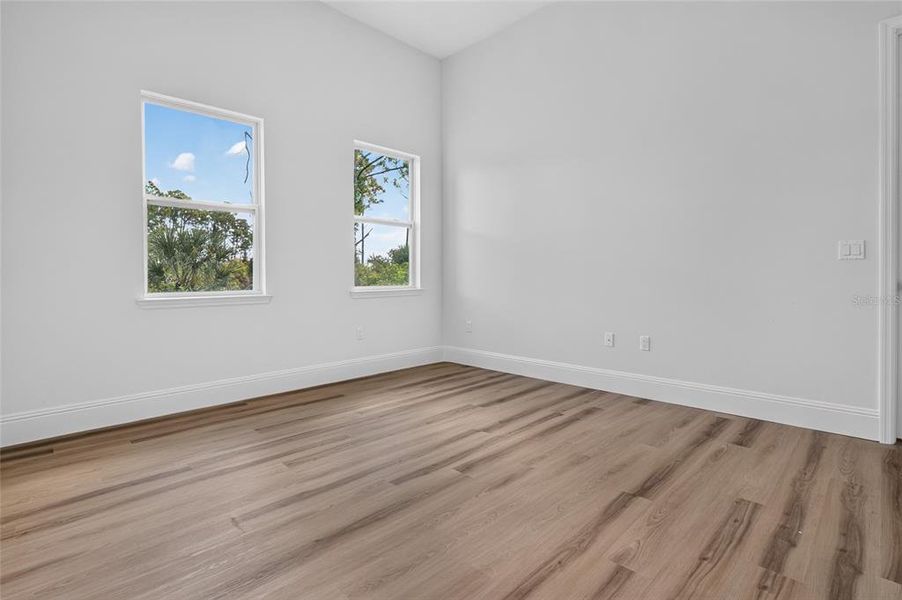 Spacious, unfurnished interior of a new home in , Port Charlotte (Image 51).