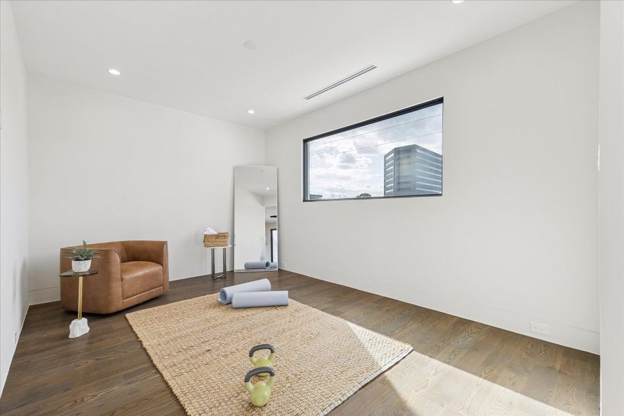 Third-floor versatile space, perfect for a home office or relaxation area.