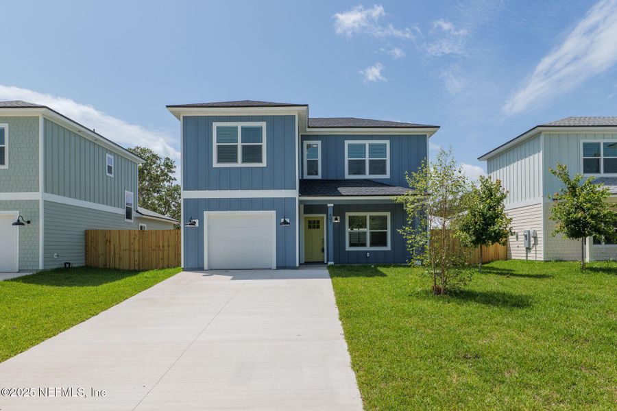 Front exterior of a new home in , St. Augustine, FL, highlighting curb appeal (Image 20).