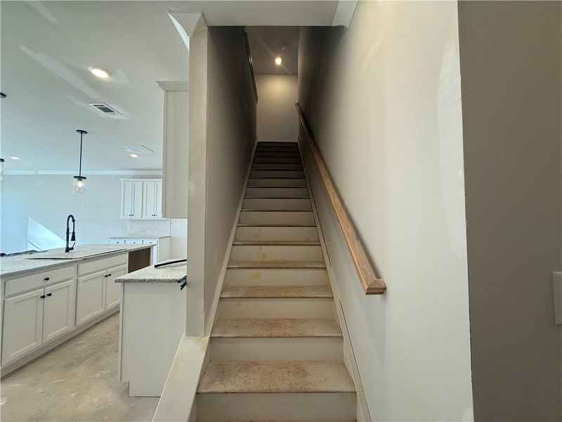 In-progress construction of a new home in The Towns at Auburn Station East, Auburn, GA (Image 28).