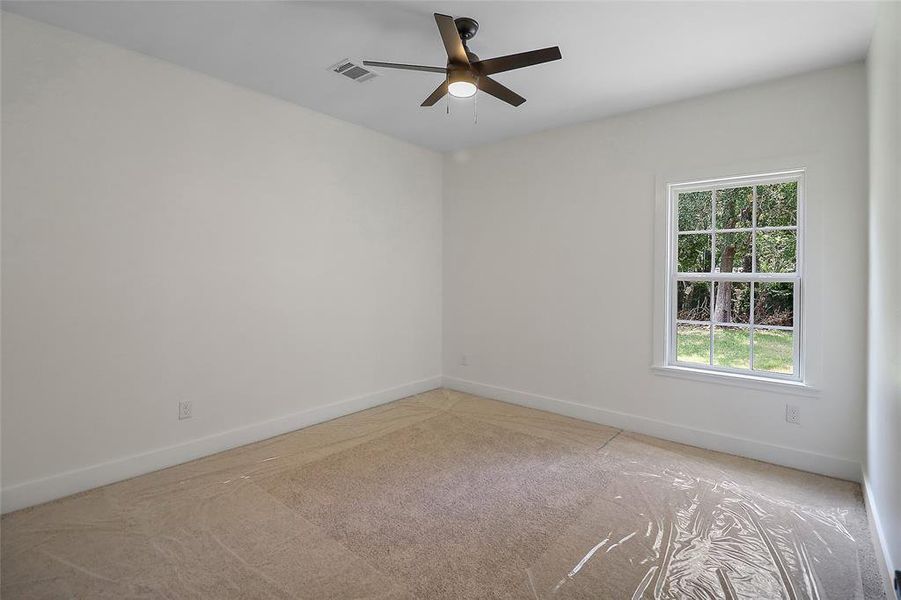 Bedroom #3: Welcome to the inviting retreats that are the secondary bedrooms of this home—each thoughtfully designed to offer comfort, style, and versatility.