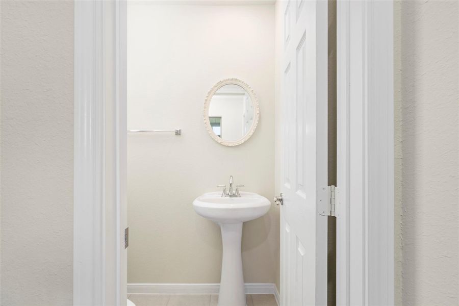 The conveniently placed powder room is an added bonus just steps from the patio. The conveniently placed powder room is an added bonus just steps from the patio.