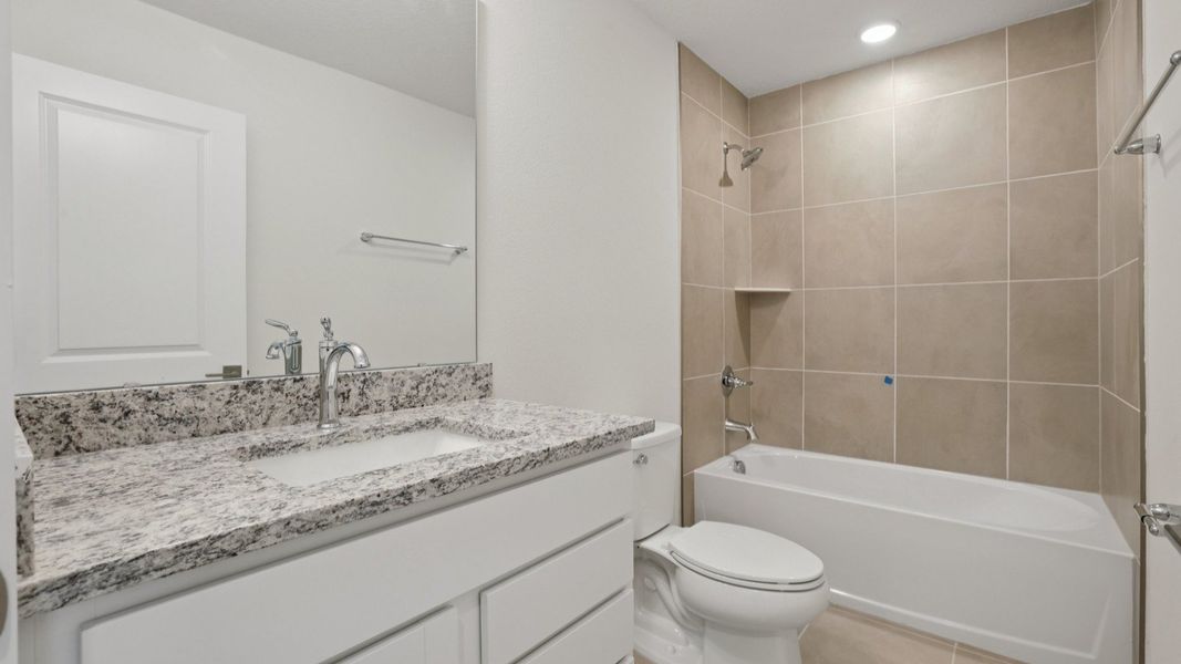 Secondary Bath of the Coronado - End at Cyrene at Harmony located in St Cloud FL by DRB Homes