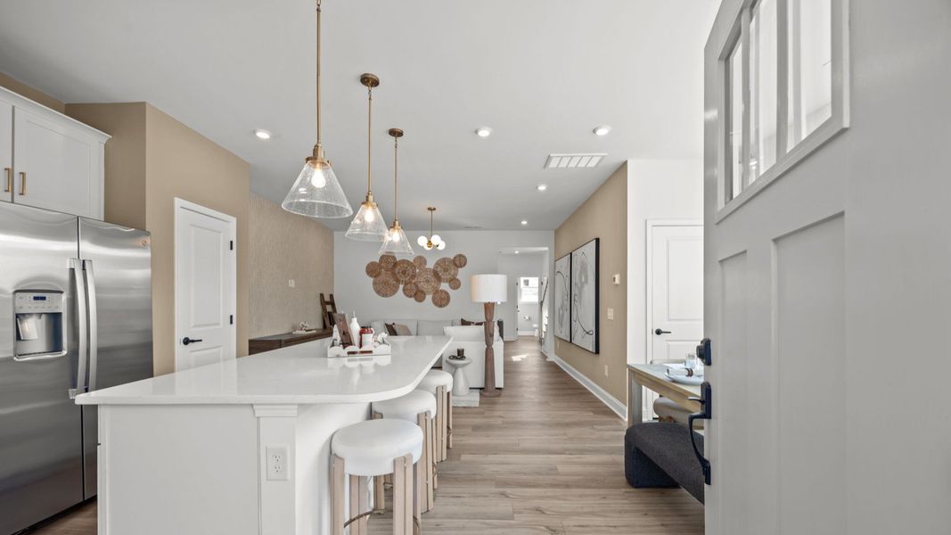 The Rochester Plan by DRB homes kitchen with modern features in Charlotte, NC.