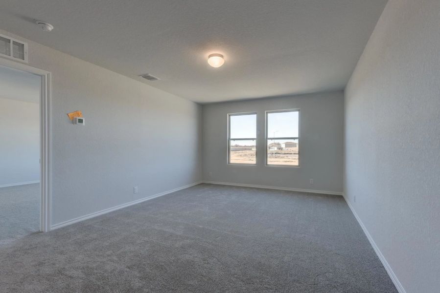 Representative unfurnished interior of a home built from the Dunlap by Ashton Woods in Meadows at Hennersby Hollow 40's, San Antonio (Image 14).