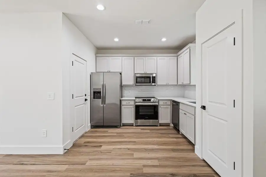 Furnished interior view inside a new home in , Denison (Image 5).