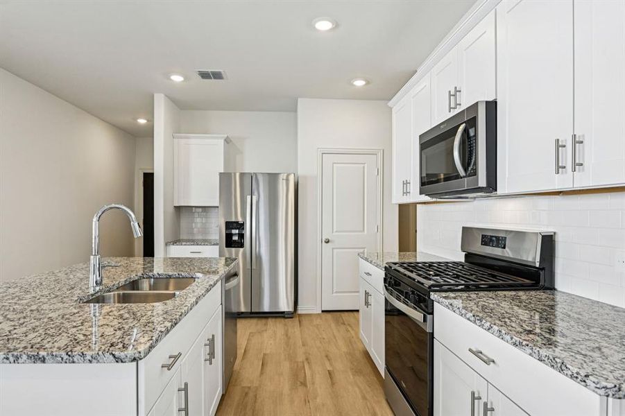 Furnished interior view inside a new home in Lakehaven - Spring Series, Farmersville (Image 10).
