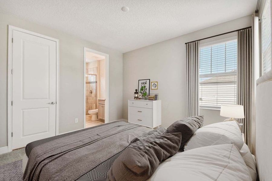 Representative furnished interior of a home built from the Sawgrass by William Ryan Homes in The Sanctuary – Royal Collection, Punta Gorda (Image 7).
