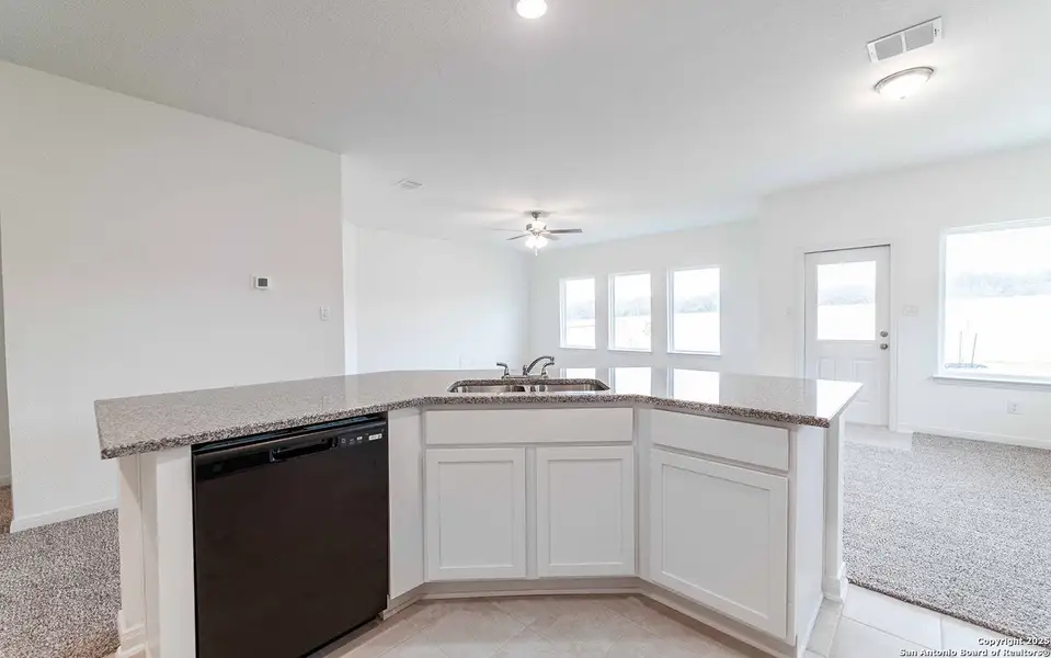 Furnished interior view inside a new home in Hunter's Ranch, San Antonio (Image 3).