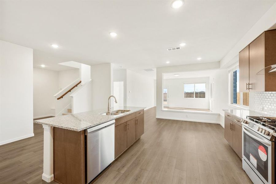 Furnished interior view inside a new home in East Oak Creek Elements, Commerce (Image 14).