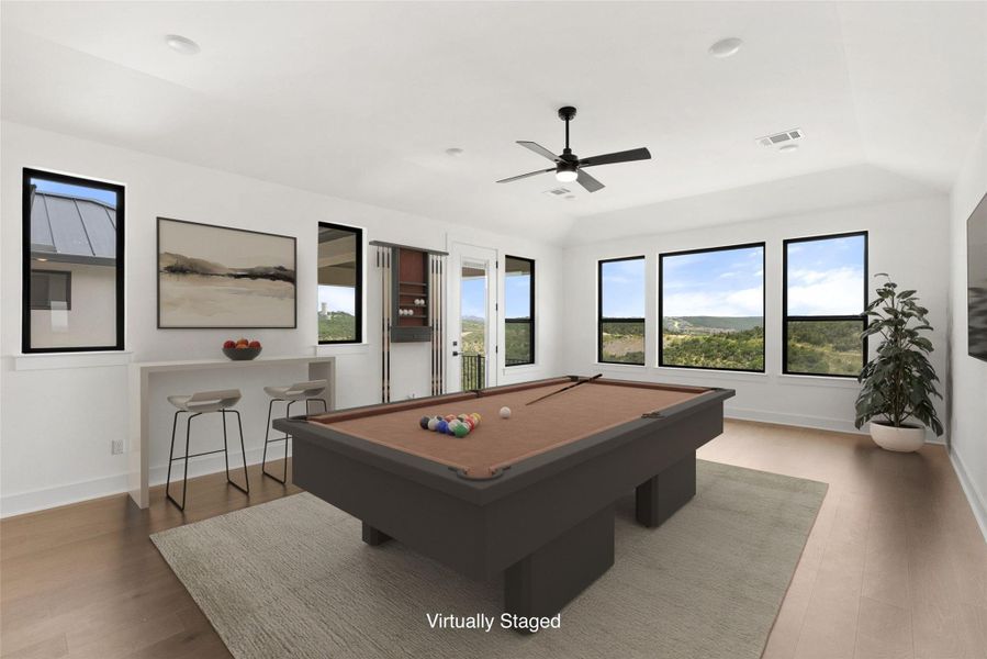 Furnished interior view inside a new home in The Estates at Rough Hollow Vista Ridge, Lakeway (Image 32).