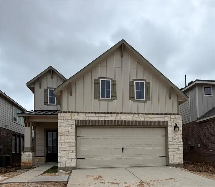 Front exterior of a new home in Bergamo, Katy, TX, highlighting curb appeal (Image 2). Front exterior of a new home in Bergamo, Katy, TX, highlighting curb appeal (Image 2).