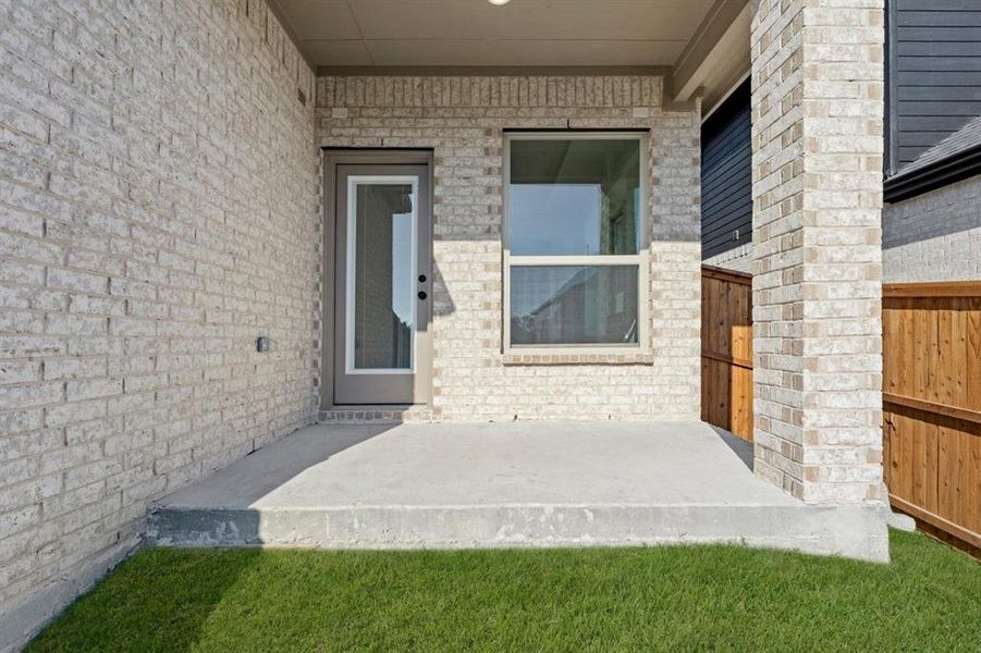 Exterior details and patio area of a home in Trails at Cottonwood Creek, Rowlett (Image 4). Exterior details and patio area of a home in Trails at Cottonwood Creek, Rowlett (Image 4).