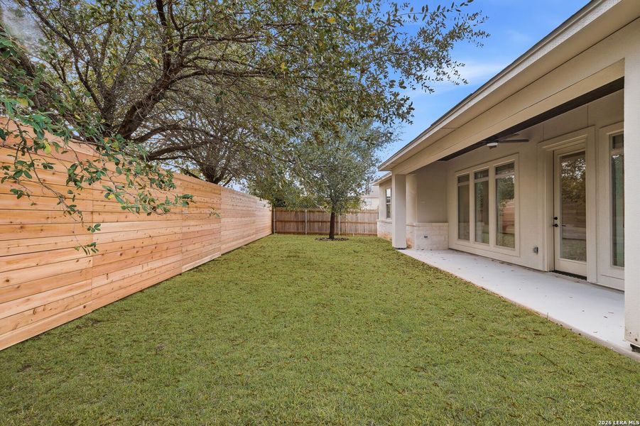 Exterior details and patio area of a home in , New Braunfels (Image 27).