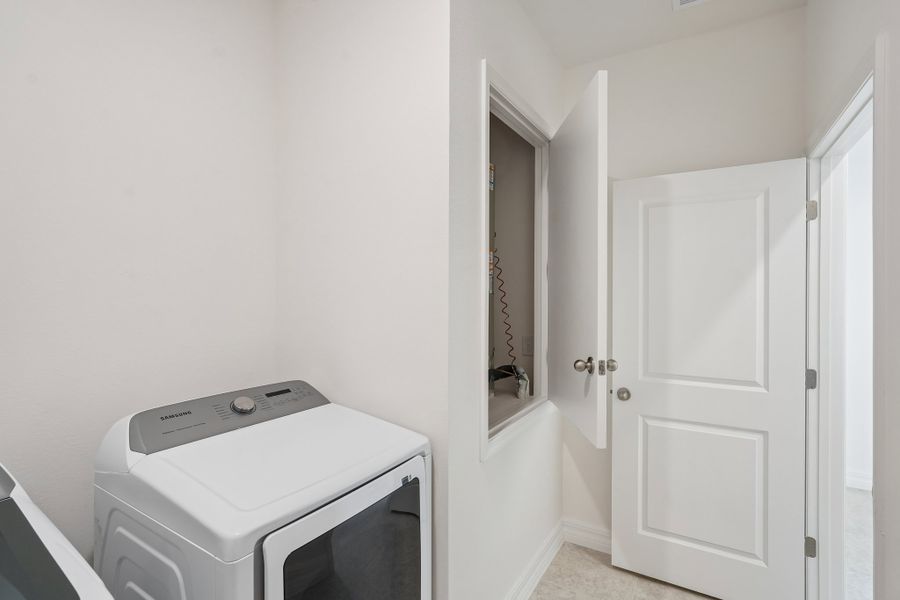 Furnished interior view inside a new home in Heritage Station, Punta Gorda (Image 15).