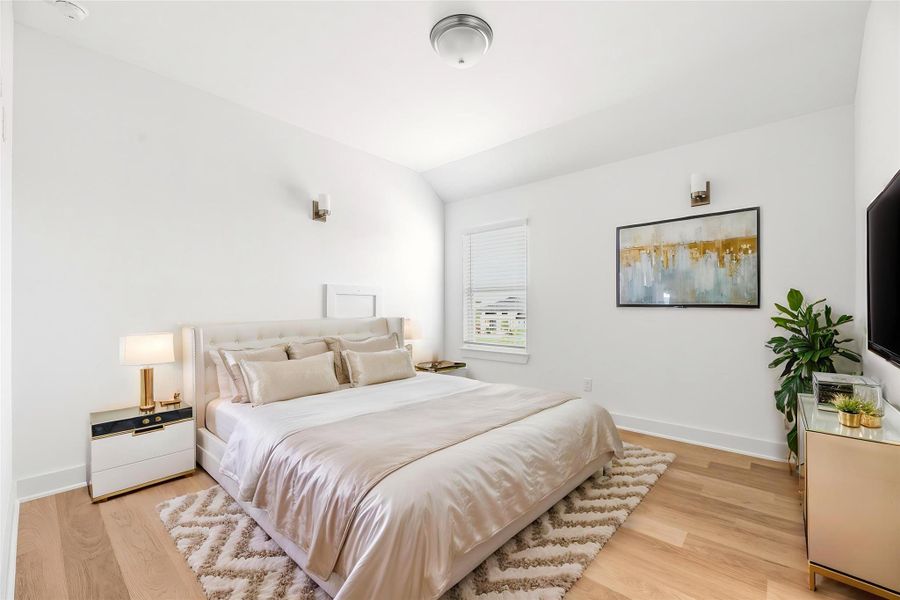 With neutral tones and high-quality craftsmanship consistent throughout the home, this bedroom is perfectly situated to serve as a calm and relaxing space. Virtually staged.