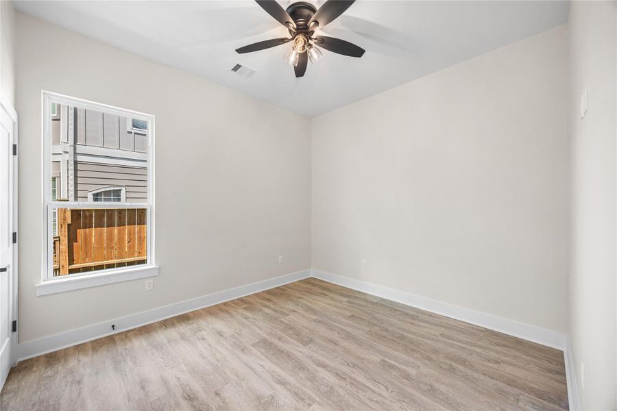 Second Spacious Secondary Bedroom with Walk-In Closet.