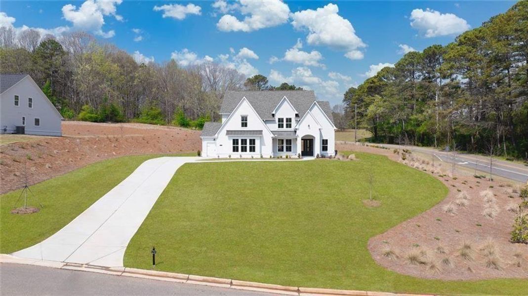 Front exterior of a new home in , Gainesville, GA, highlighting curb appeal (Image 30).