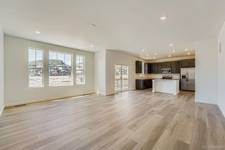 Spacious, unfurnished interior of a new home in Ken-Caryl Ranch: The Pioneer Collection, Littleton (Image 10). Spacious, unfurnished interior of a new home in Ken-Caryl Ranch: The Pioneer Collection, Littleton (Image 10).