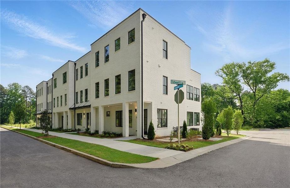 Front exterior of a new home in , Atlanta, GA, highlighting curb appeal (Image 1).