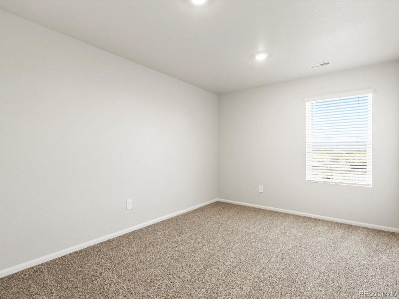 Spacious, unfurnished interior of a new home in Poudre Heights: The Lakes Collection, Windsor (Image 18).