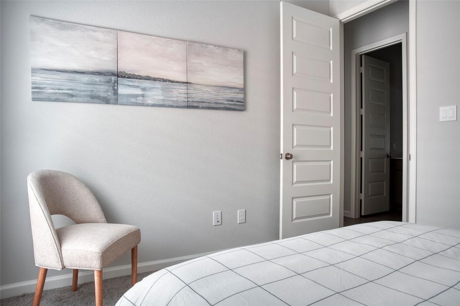 Discover a tranquil bedroom retreat featuring modern decor, soft neutral tones, and a stylish chair. Perfect for relaxation and comfort. Discover a tranquil bedroom retreat featuring modern decor, soft neutral tones, and a stylish chair. Perfect for relaxation and comfort.