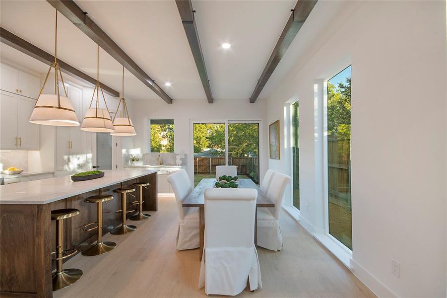 Sunroom with beamed ceiling