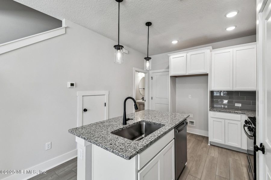 Furnished interior view inside a new home in Kettering at eTown - Garden Collection, Jacksonville (Image 7). Furnished interior view inside a new home in Kettering at eTown - Garden Collection, Jacksonville (Image 7).