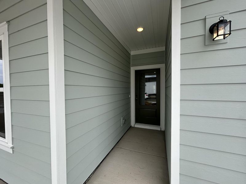 Exterior details and patio area of a home in Tea Farm, Ravenel (Image 4). Exterior details and patio area of a home in Tea Farm, Ravenel (Image 4).