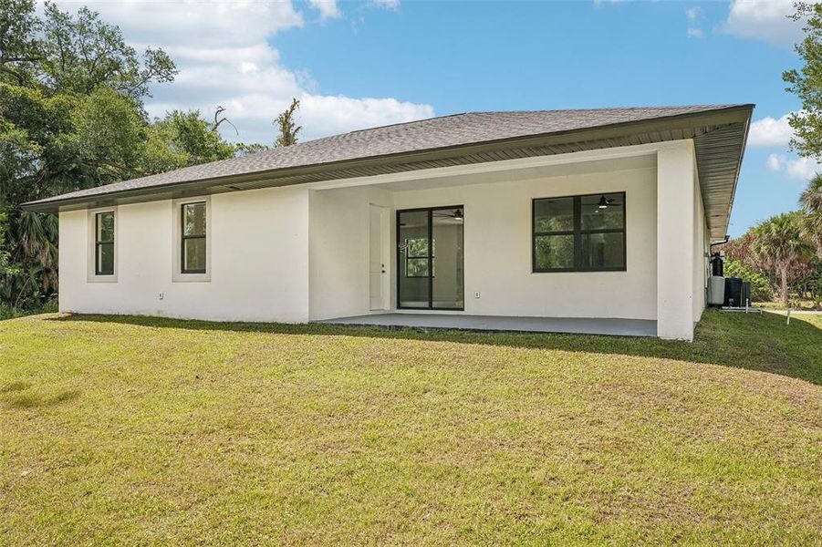 Exterior details and patio area of a home in , Port Charlotte (Image 29).