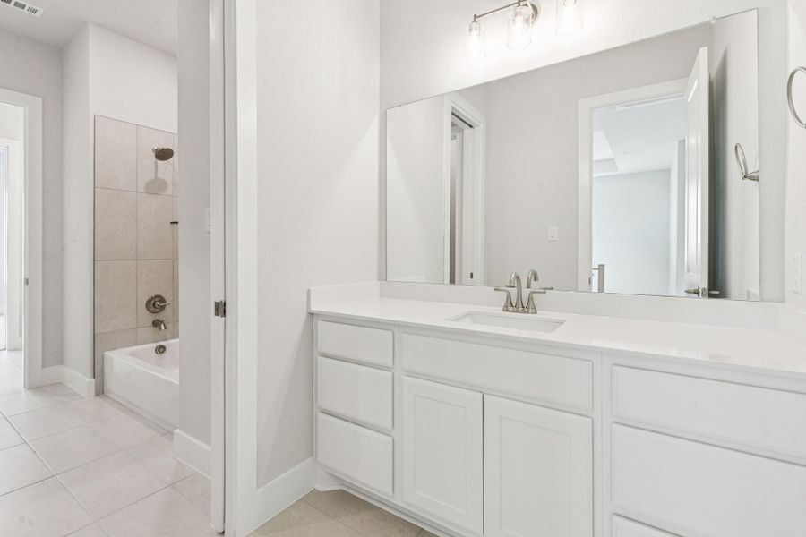 Representative furnished interior of a home built from the Hamilton by Centre Living Homes in Newman Village Townhomes, Frisco (Image 13).