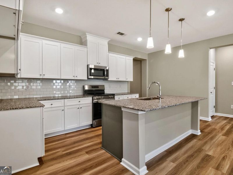 Furnished interior view inside a new home in Ivy Glen, Perry (Image 4).