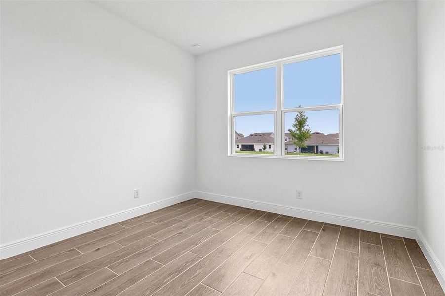 Spacious, unfurnished interior of a new home in Park View at the Hills, Minneola (Image 18).