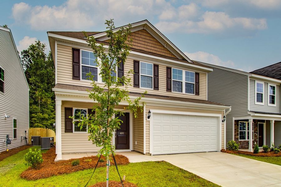Front exterior of a new home in Ellington, Elgin, SC, highlighting curb appeal (Image 27).