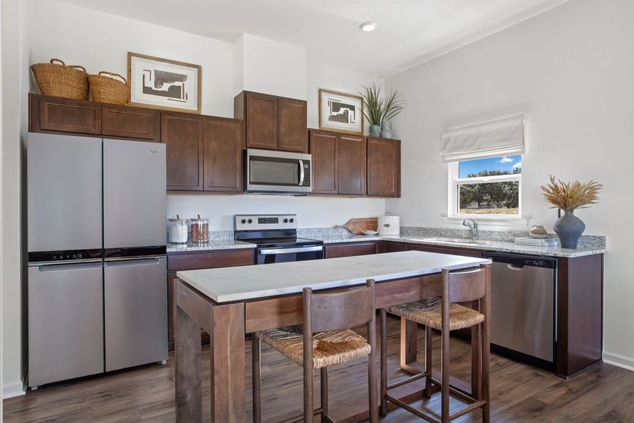 Representative furnished interior of a home built from the Plan 1445 by KB Home in Freeman Farms, Youngsville (Image 5). Representative furnished interior of a home built from the Plan 1445 by KB Home in Freeman Farms, Youngsville (Image 5).