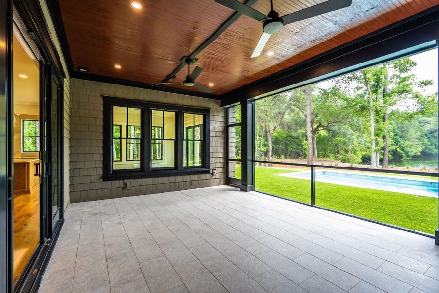 Exterior details and patio area of a home in , Johns Island (Image 47).