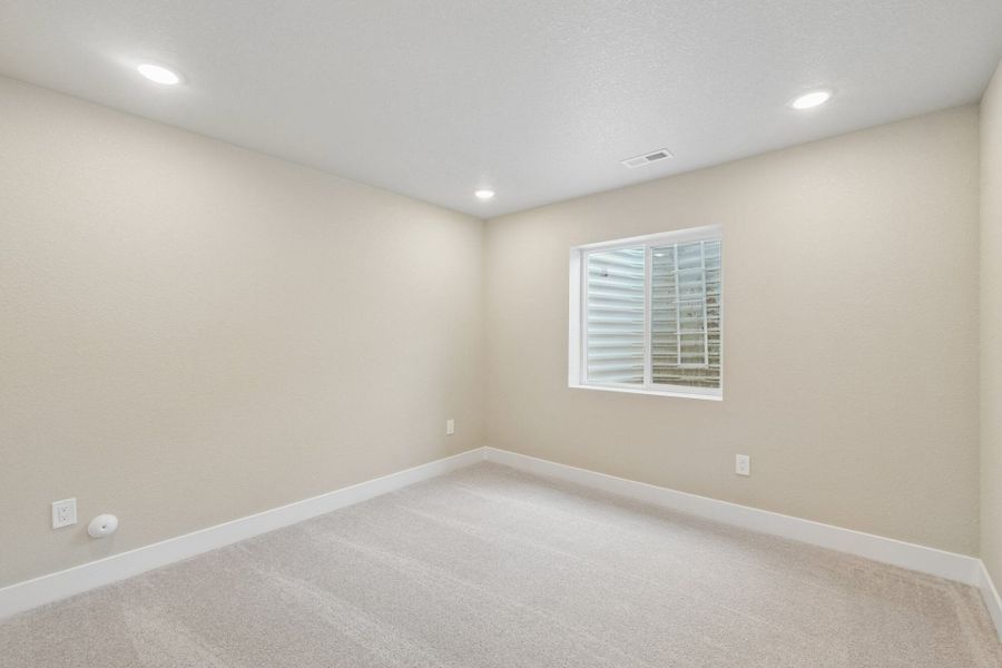 Spacious, unfurnished interior of a new home in The Trails at Aspen Ridge, Colorado Springs (Image 56).