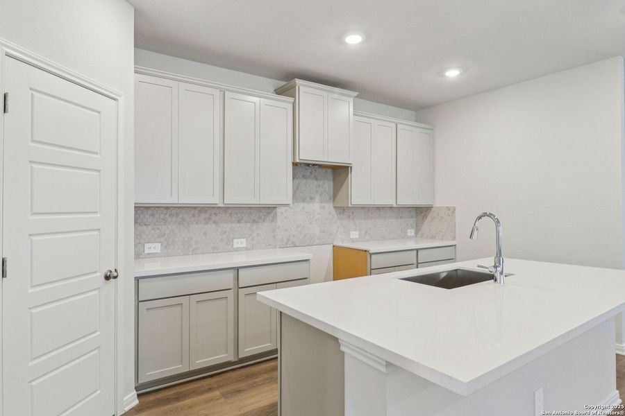 Furnished interior view inside a new home in Estancia Ranch - Premier Series, San Antonio (Image 10). Furnished interior view inside a new home in Estancia Ranch - Premier Series, San Antonio (Image 10).