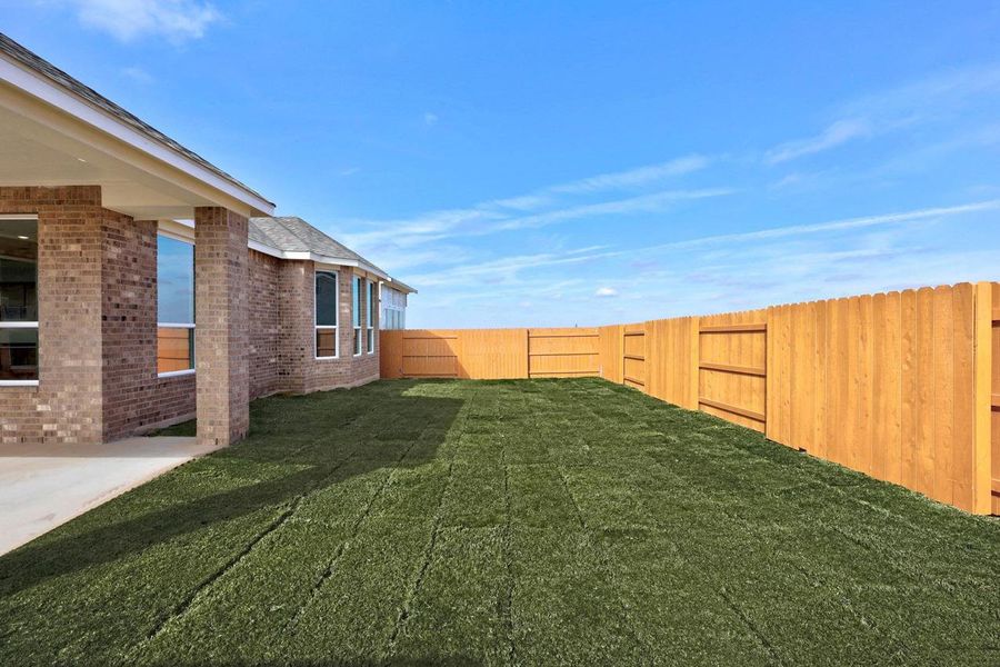 Exterior details and patio area of a home in Lariat, Liberty Hill (Image 3). Exterior details and patio area of a home in Lariat, Liberty Hill (Image 3).