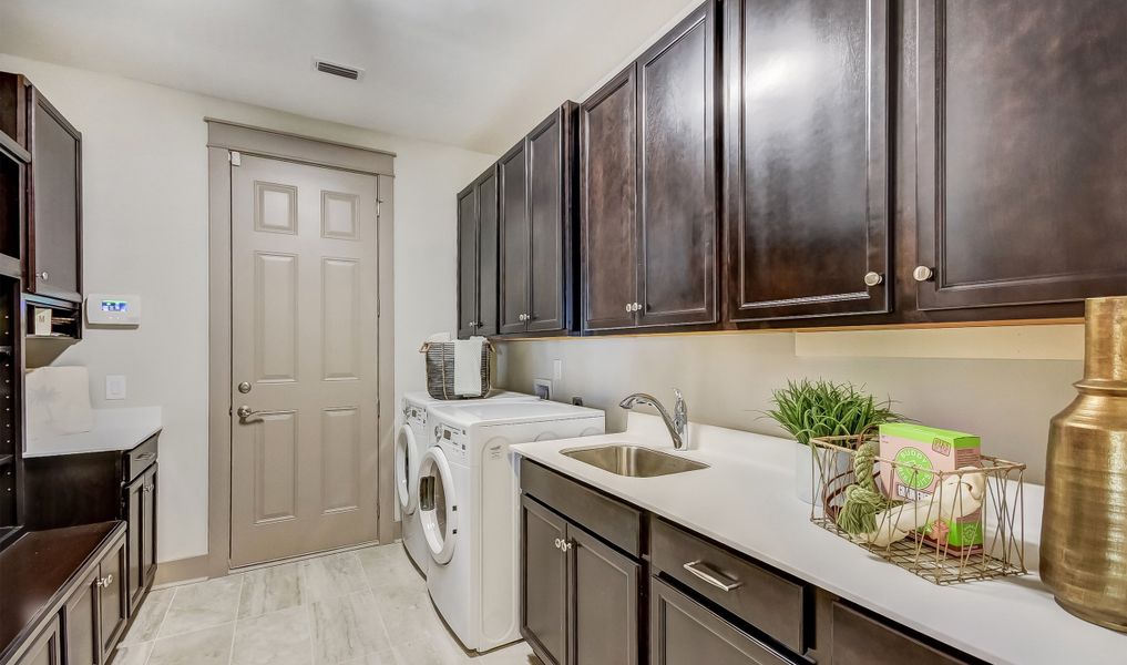 Laundry room with cabinet space