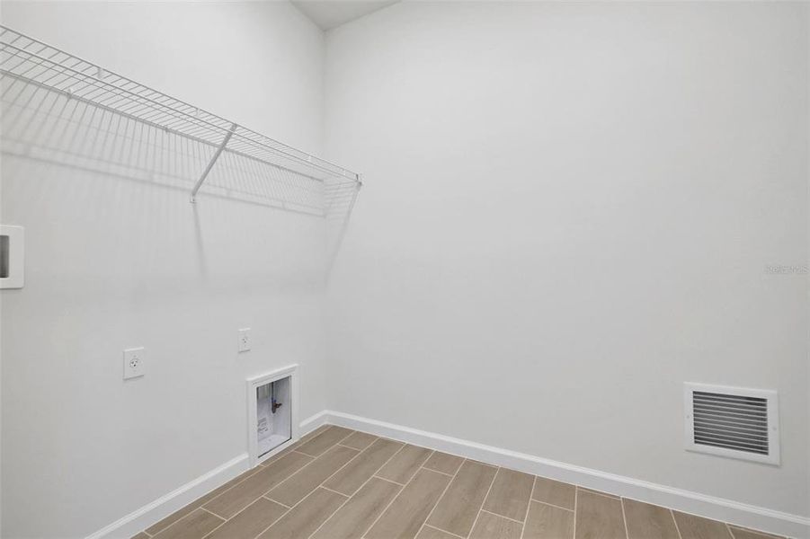 Spacious, unfurnished interior of a new home in Brystol North at Wylder, Port St. Lucie (Image 31).