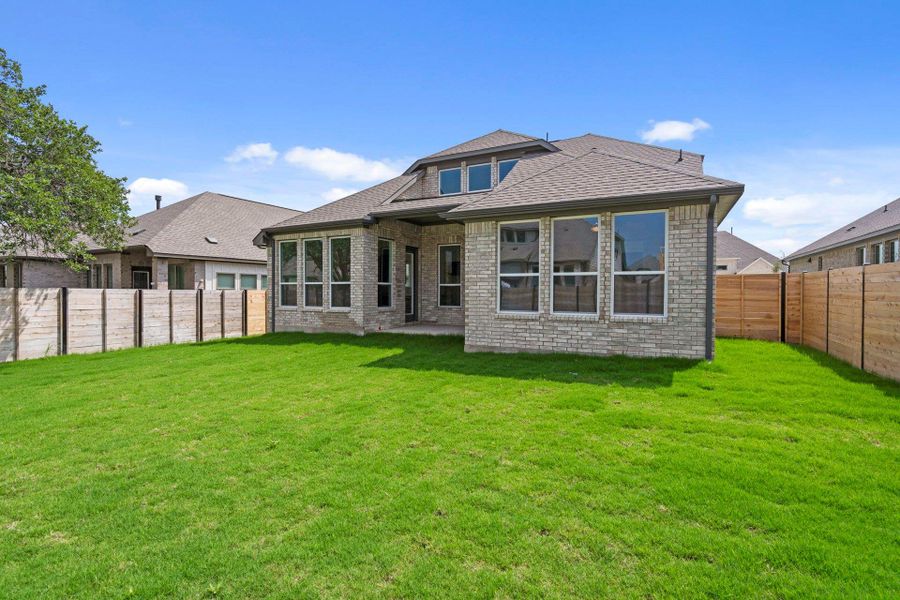Rear of Home and Private Backyard