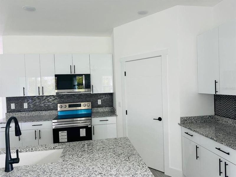 Furnished interior view inside a new home in , Port Charlotte (Image 8).