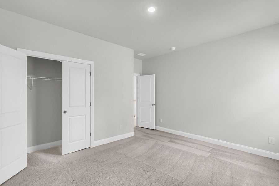 Spacious, unfurnished interior of a new home in Tidewater at Lakes of Cane Bay, Summerville (Image 35). Spacious, unfurnished interior of a new home in Tidewater at Lakes of Cane Bay, Summerville (Image 35).