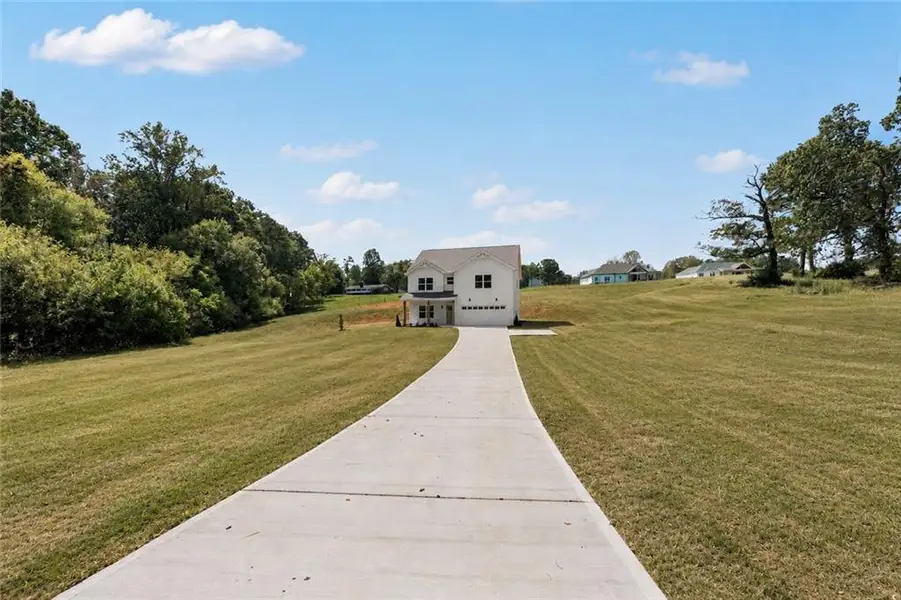Front exterior of a new home in , Clarkesville, GA, highlighting curb appeal (Image 20). Front exterior of a new home in , Clarkesville, GA, highlighting curb appeal (Image 20).