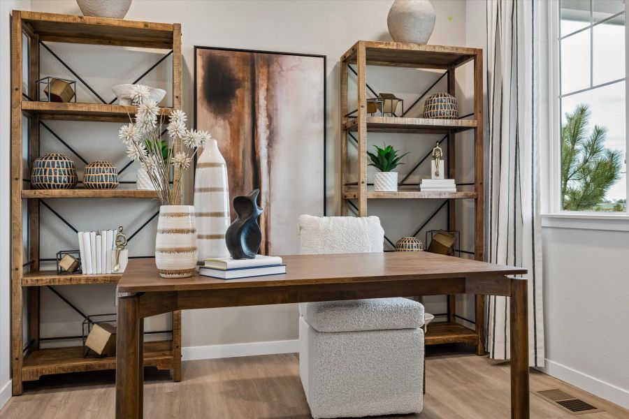 A room with a table and shelves. A room with a table and shelves.