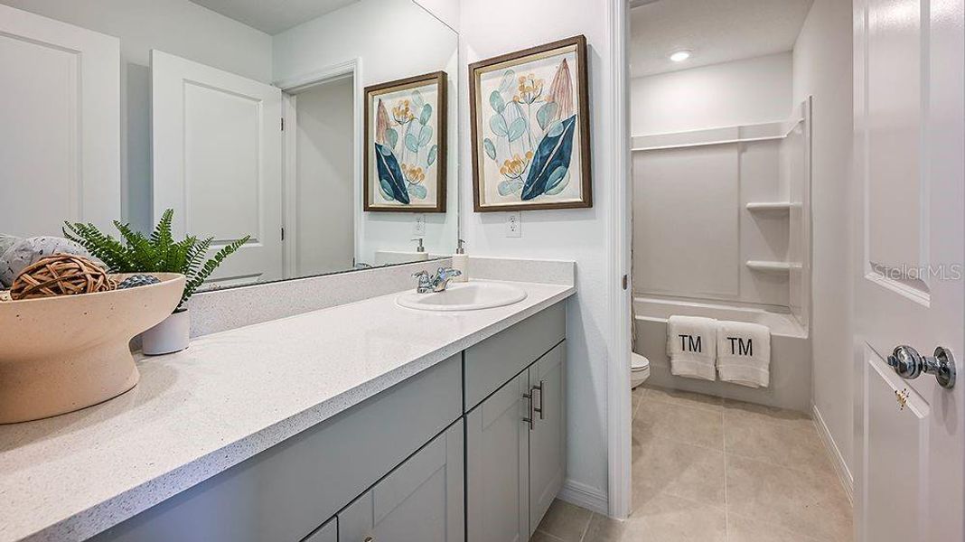 Furnished interior view inside a new home in Waterstone, Groveland (Image 12).