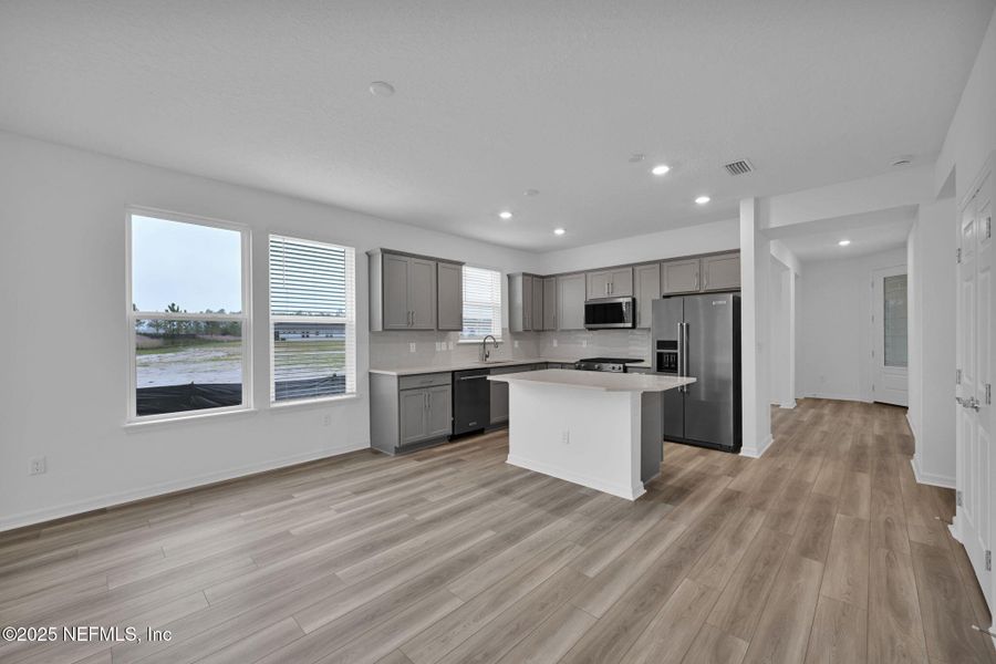 Furnished interior view inside a new home in Del Webb Wildlight, Yulee (Image 7).